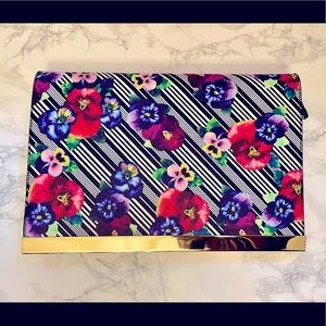 ALDO striped and floral clutch